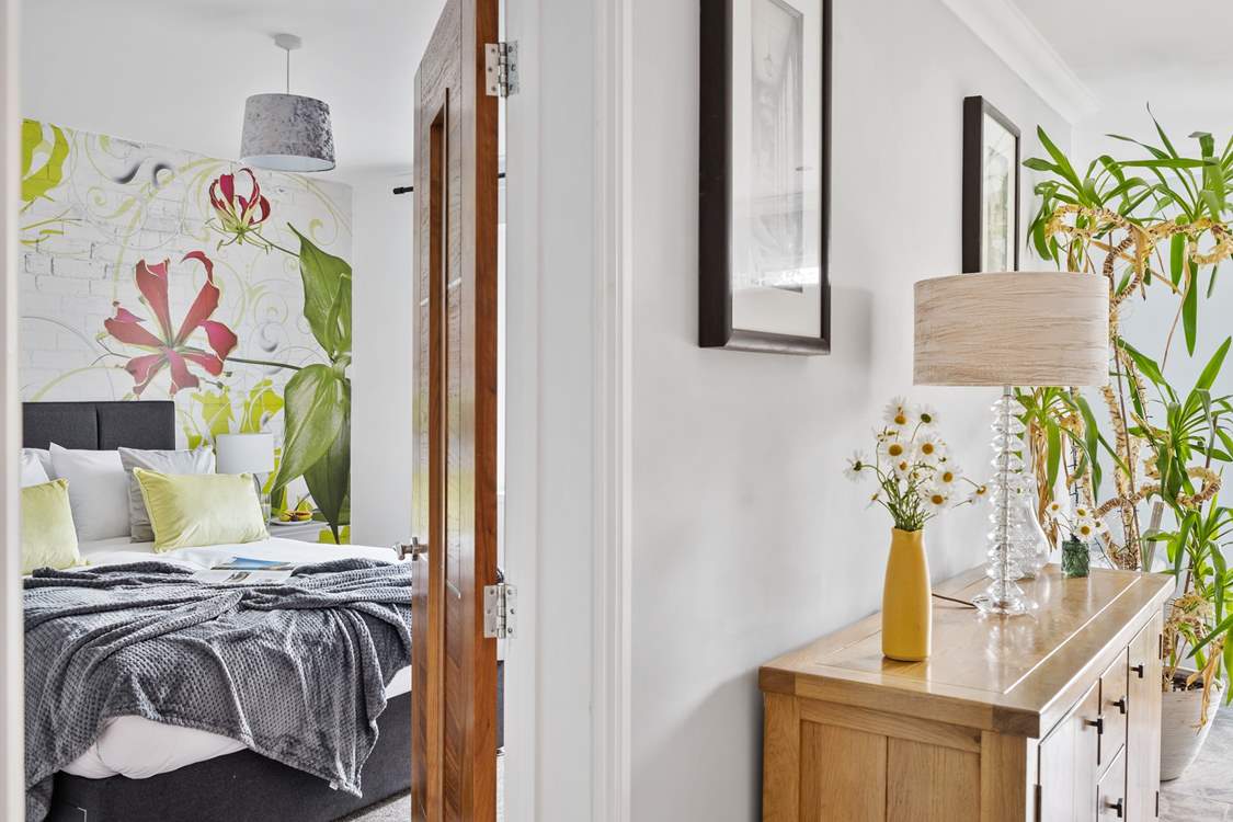 Head back to the hallway to find bedroom 1 on the ground floor.