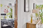 Head back to the hallway to find bedroom 1 on the ground floor.