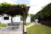 The barbecue benefits from a sail which provides shade on those hot sunny days.