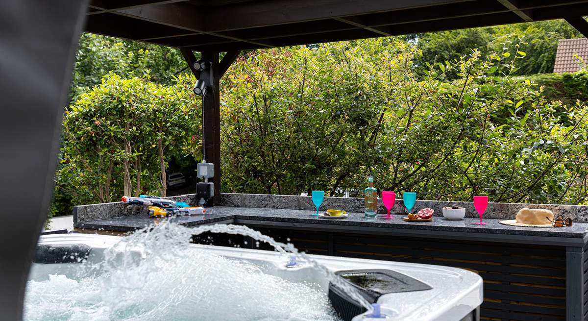 A hot tub and bar area for you to enjoy.