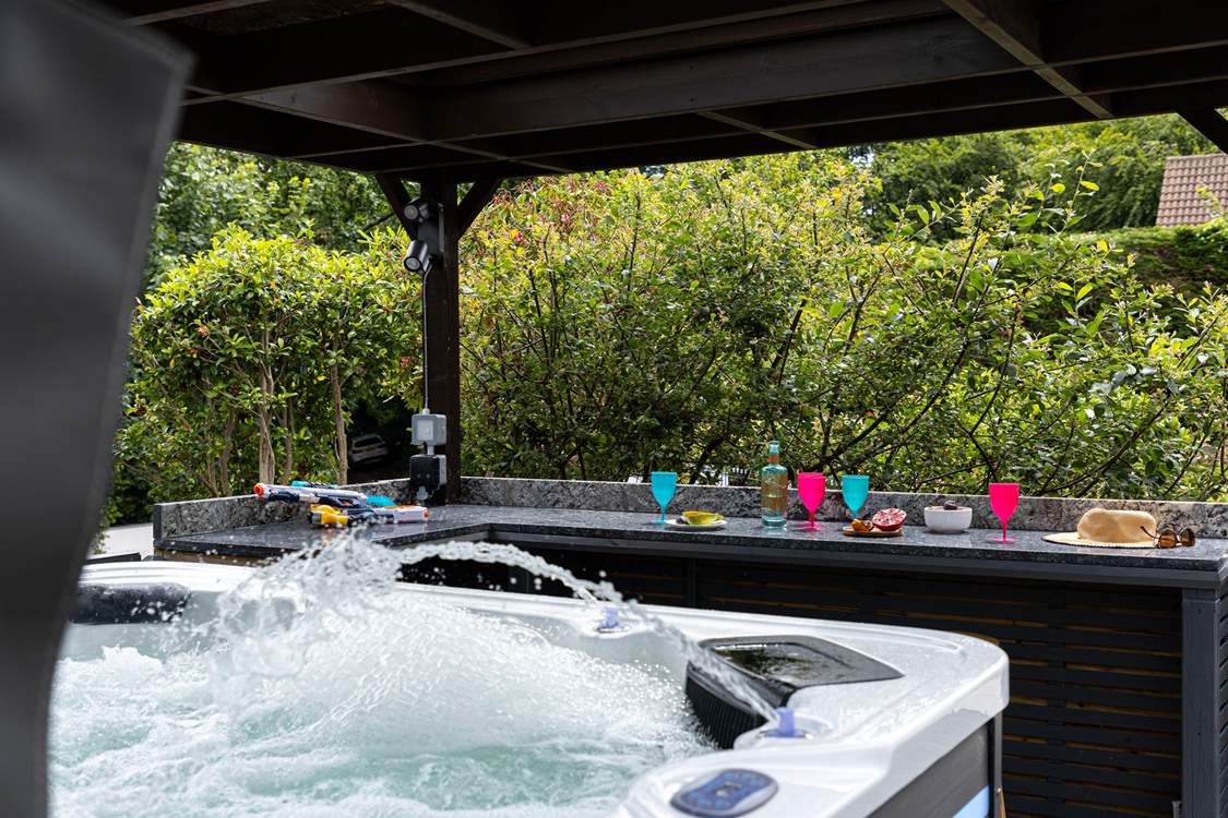 A hot tub and bar area for you to enjoy.