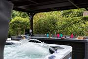 A hot tub and bar area for you to enjoy.