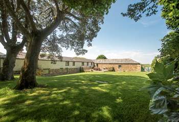 The large lawned-area will delight both adults and children.
