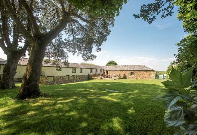 The large lawned-area will delight both adults and children.
