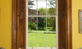 The window perfectly frames the beautiful view of the grounds.. - Thumbnail Image