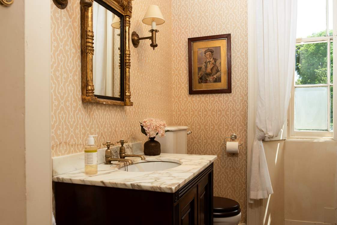 The period styling continues in the cloakrooms.
