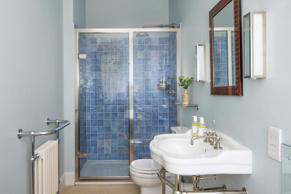 Bedroom 3 has its own en suite with separate shower and bath.