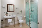 There is also a separate shower cubicle.