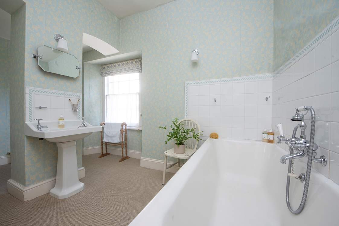 Period styling in the family bathroom.