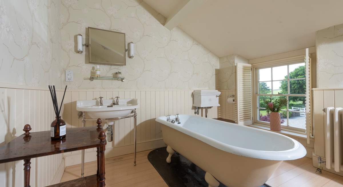 This wonderful room has plenty of space for a gorgeous free-standing bath and....