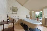 This wonderful room has plenty of space for a gorgeous free-standing bath and....