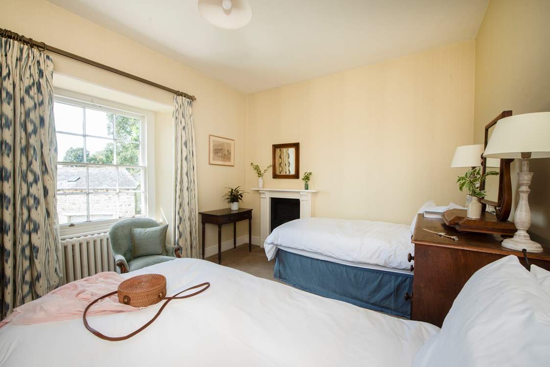 A charming twin bedded room with wonderful original features.