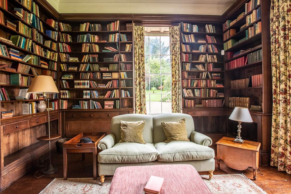 Curl up with a good book in the library - there are plenty to choose from!