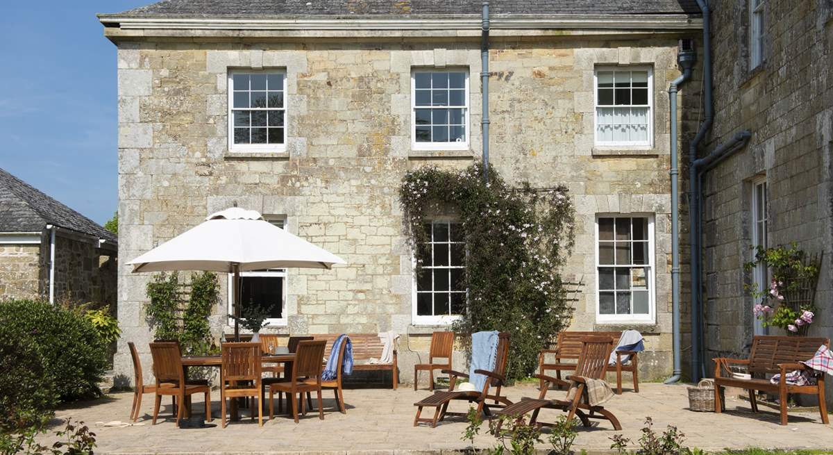 The sunny terrace beckons you outside for meals al fresco or simply lounging in the sunshine.