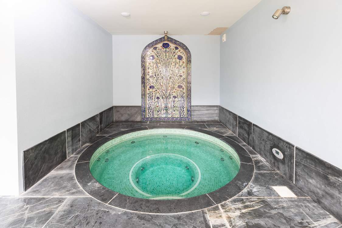 Holidays all about relaxation and the sunken hot tub will certainly help you along the way.