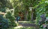 A children's play-area and cooling shady areas in the garden. - Thumbnail Image