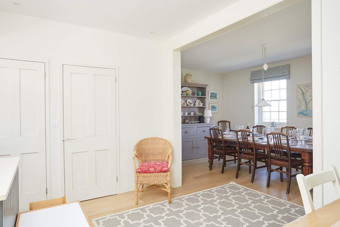 Creating a sociable space, the kitchen effortlessly connects with the dining-room.