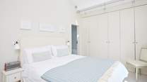 Beautiful built-in storage to accommodate plenty of clothing. 