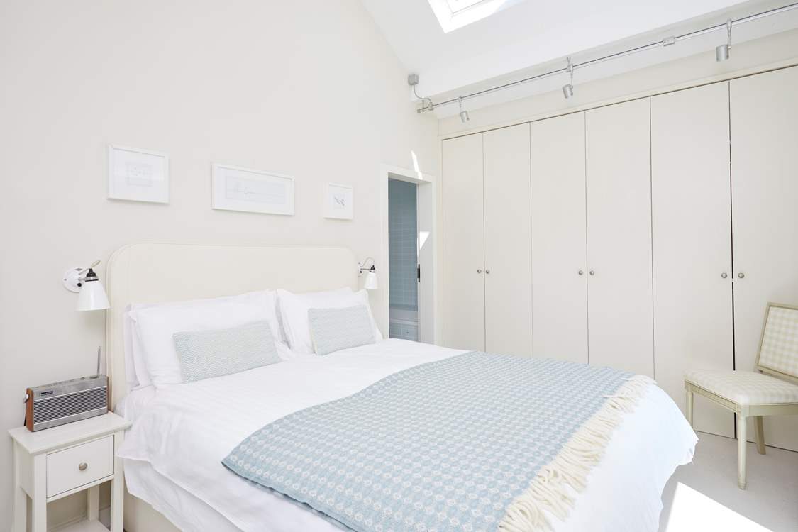 Beautiful built-in storage to accommodate plenty of clothing.