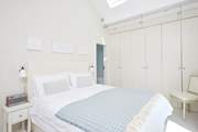 Beautiful built-in storage to accommodate plenty of clothing.