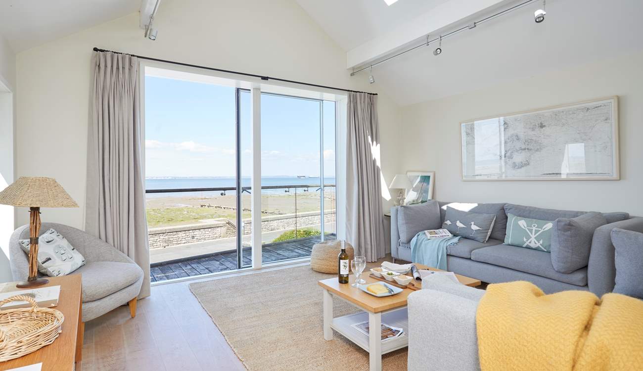 The snug with access onto a balcony where you can take a seat and breathe in the salty sea air.
