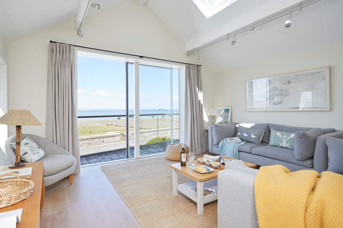 The snug with access onto a balcony where you can take a seat and breathe in the salty sea air.