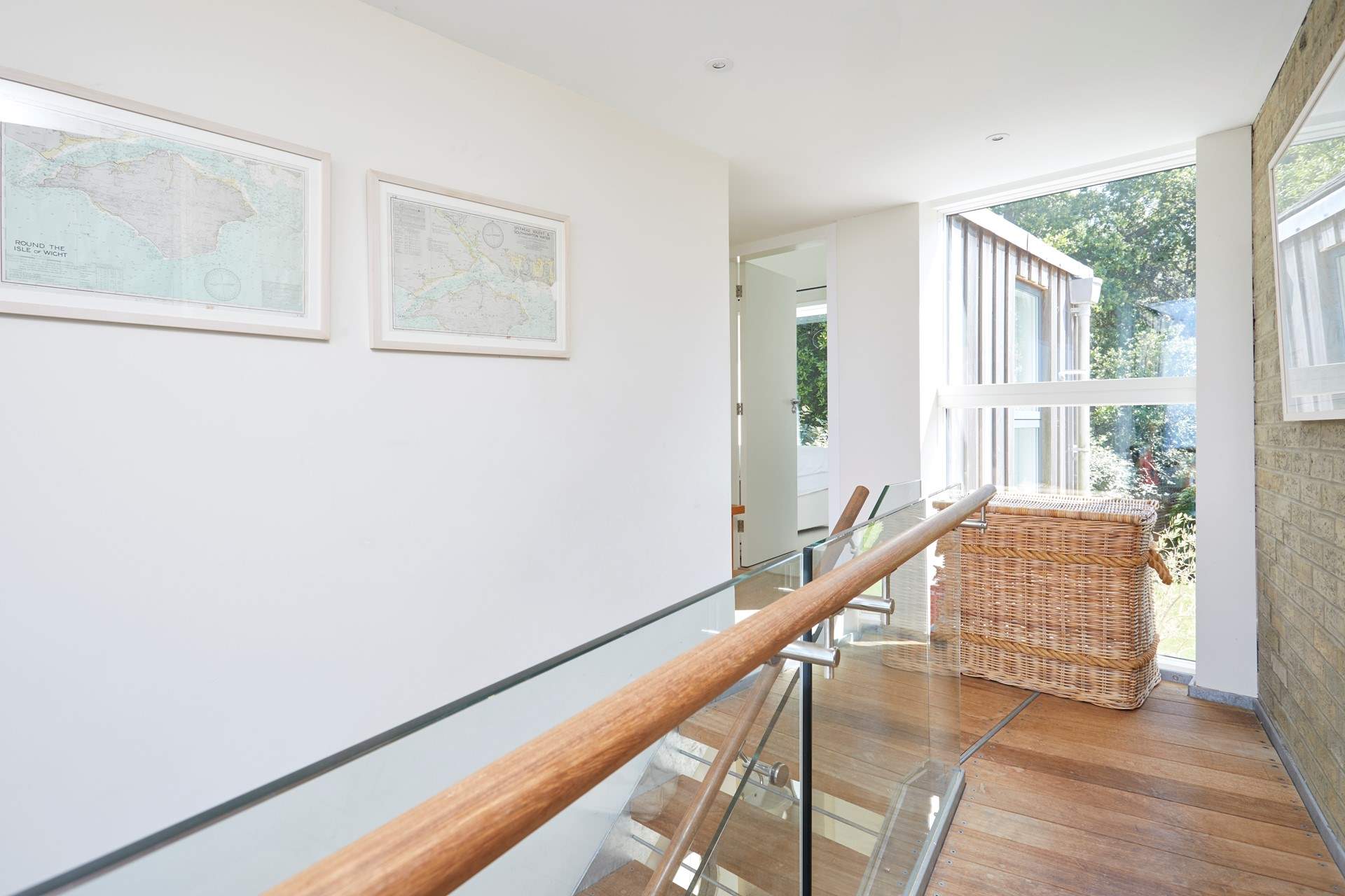 Up to the naturally light first floor landing.