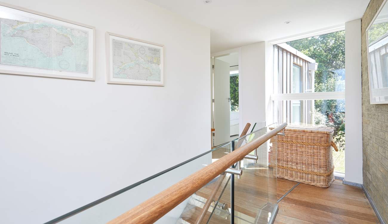 Up to the naturally light first floor landing.