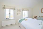 Dreamy sea views from a spacious king.