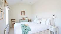 A cosy and welcoming king room.