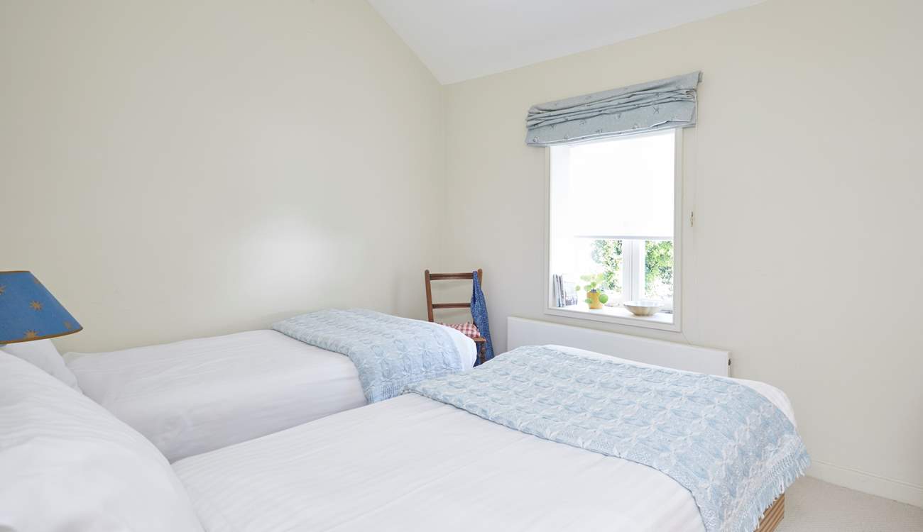 At the front of the home, the twin room enjoys sea views.
