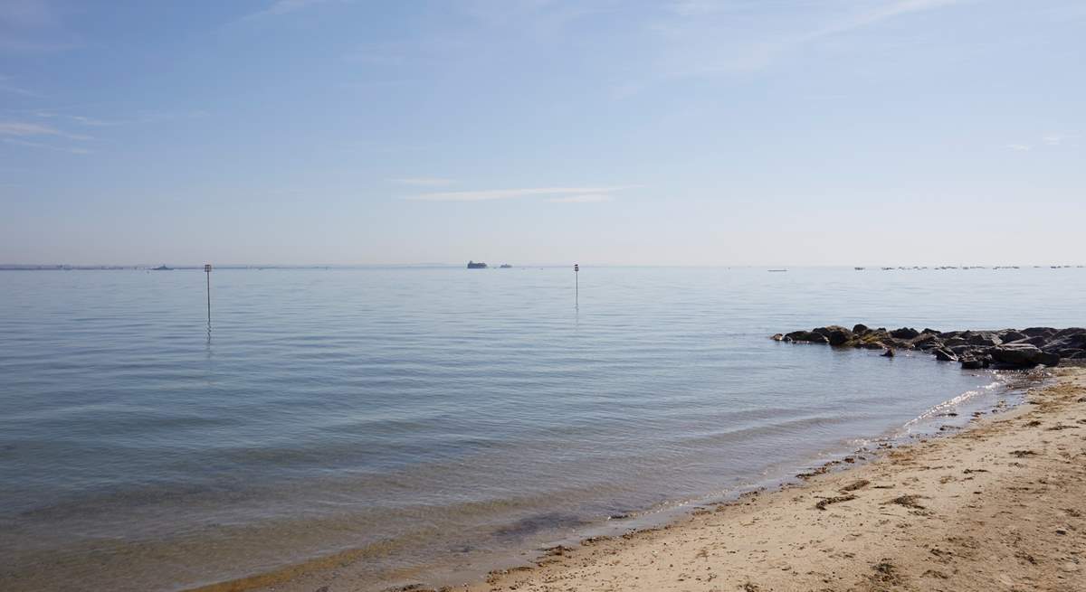 The beach is only a few steps from the front door.