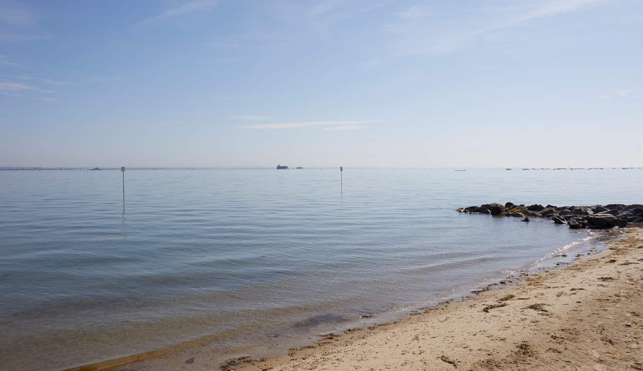 The beach is only a few steps from the front door.
