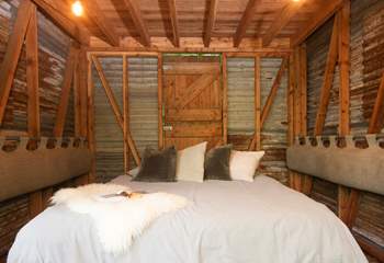 The sofas cleverly transform into a cosy double bed. 