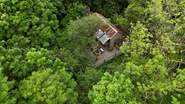 Nestled in the forest, this perfectly rustic retreat offers a soulful escape.