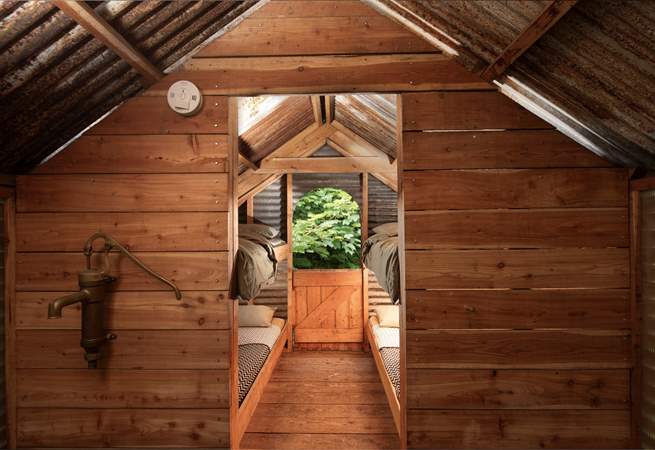 Four extra single beds can be found upstairs. 