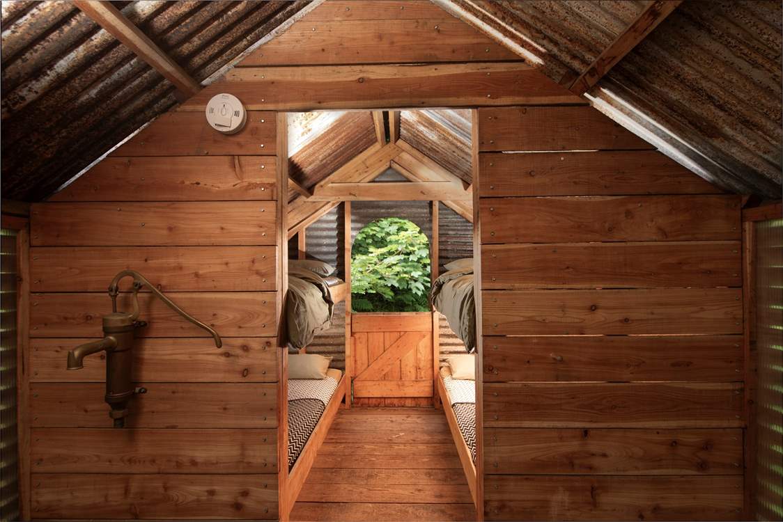 Four extra single beds can be found upstairs.