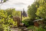 Soak up the sea views from the blissful wood-fired tub. 