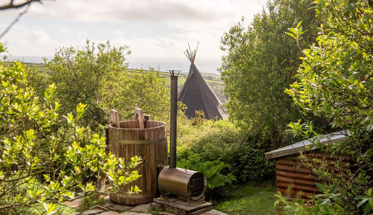 Soak up the sea views from the blissful wood-fired tub. 