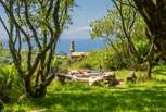 The communal fire pit areas boast blissful sea views.