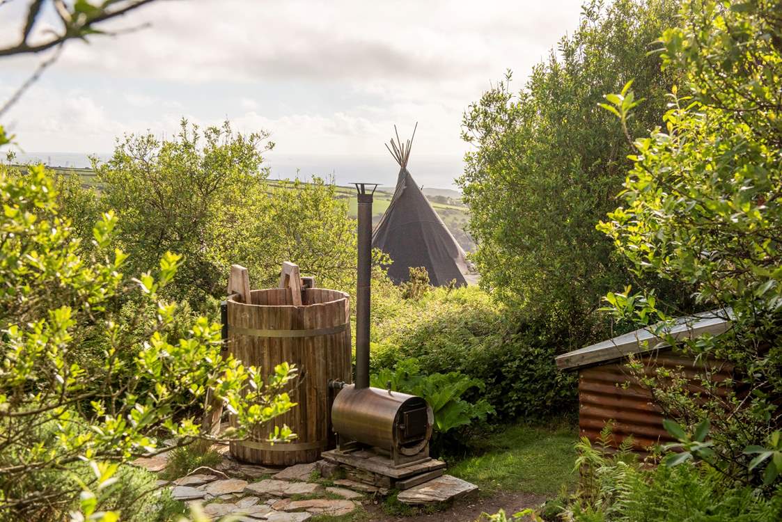 A dunk in the wood-fired hot tub adds a touch of luxury to your getaway.