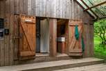 The showers and toilets can be found next to the communal kitchen. 