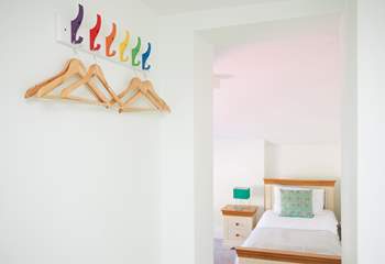 The second twin room with a handy hanging space.