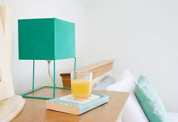 The pops of colour make this house feel like a home.