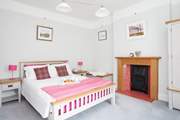 This comfy bedroom is a great space to relax in after a day spent exploring.
