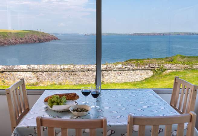 Watch the magnificent Pembrokeshire sunsets over dinner. 
