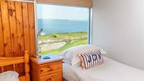 Haven High sleeps three with an option for a fourth person in this sweet coastal bedroom. Listen out for the sea crashing onto the rocks below. 