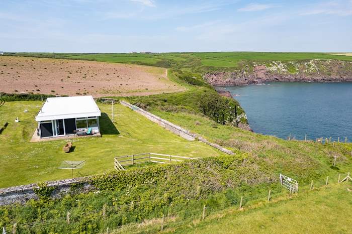 Haven High is a 2 bedroom, dog friendly holiday cottage with sea views near Dale.