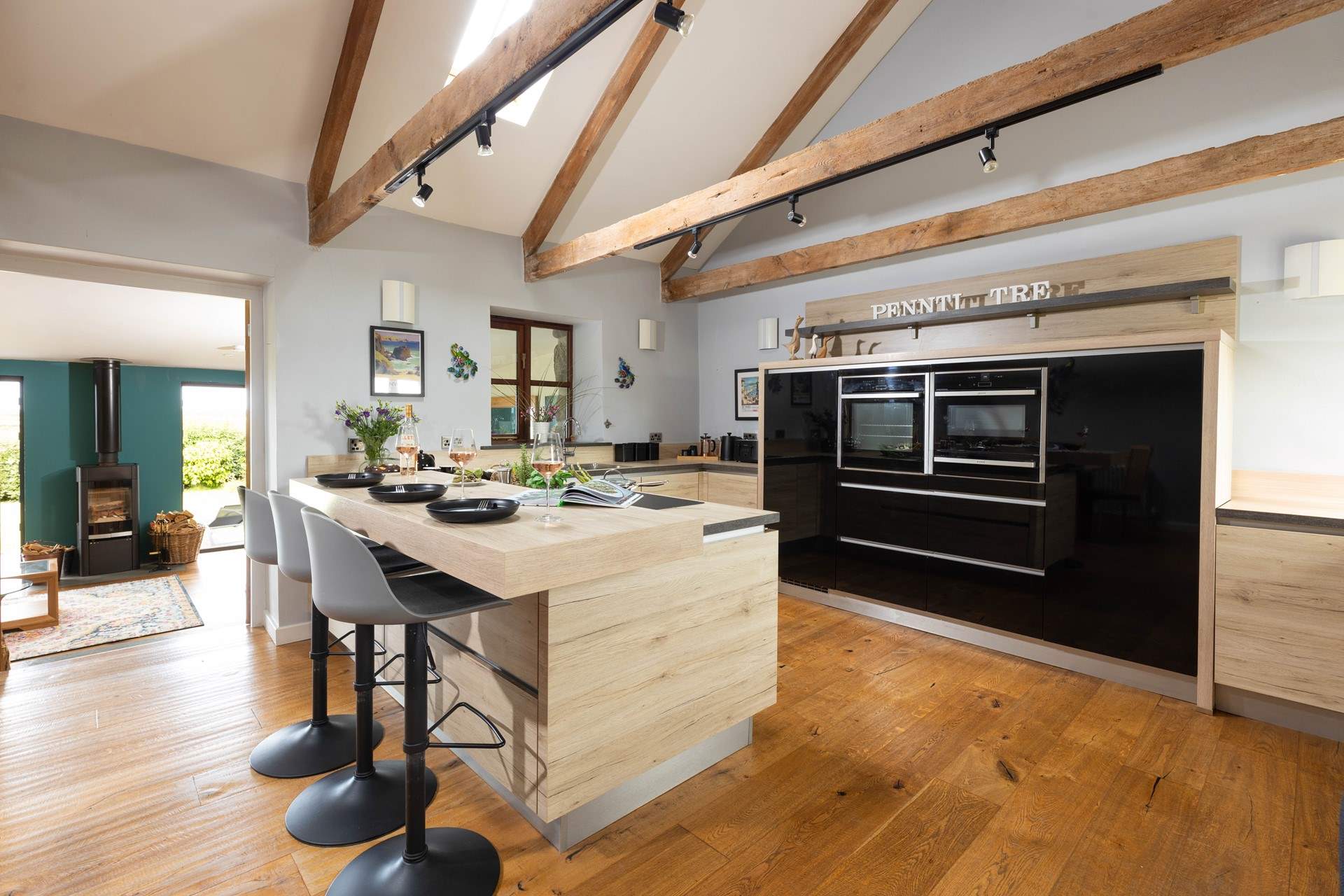 Step down from the kitchen to the sitting-room to admire the amazing views.