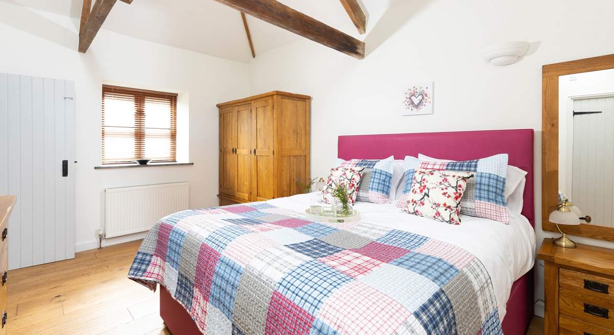 Bedroom 3 has a super-king double bed with luxurious linens.